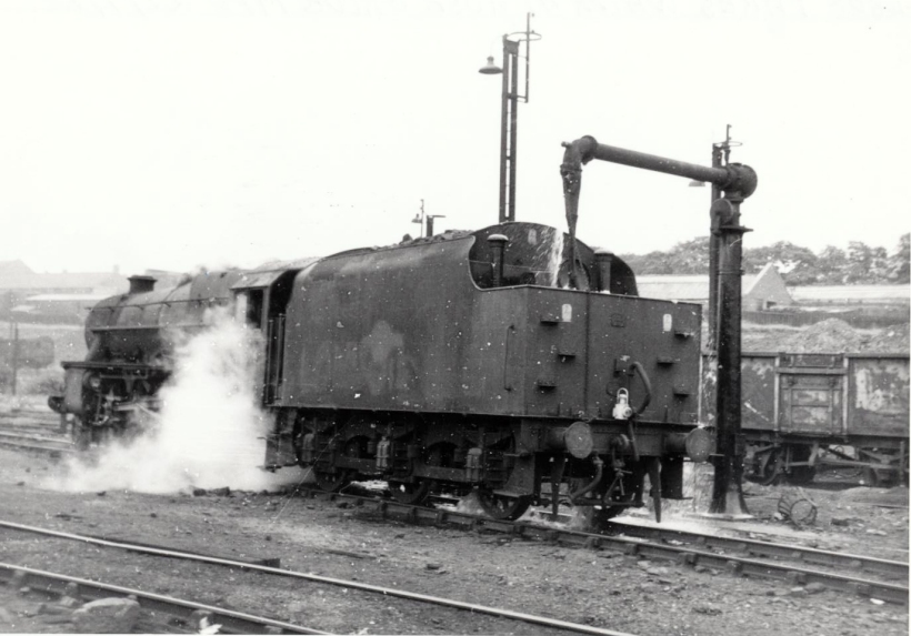 A loco that made it into preservation was Stanier Black 5 44806, and here she is seen taking water at Rose Grove on 22 July 1968. She first moved to Carnforth, then the Lakeside Railway, and then when firebox problems forced a retirment, she moved to Steamport Southport.