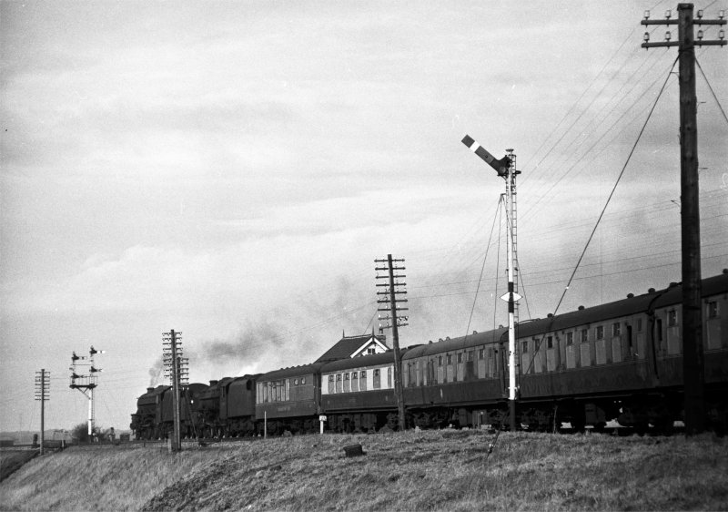 Stanier Black 5s 44809 and 45707 arrive at Burscough Junction North over the northern curve with Empty Coaching Stock from Southport for 1X38 return Grand National special Aintree Sefton Arms – Grimsby with ex-Devon Belle Observation Car M280 on Saturday 26 March 1966.