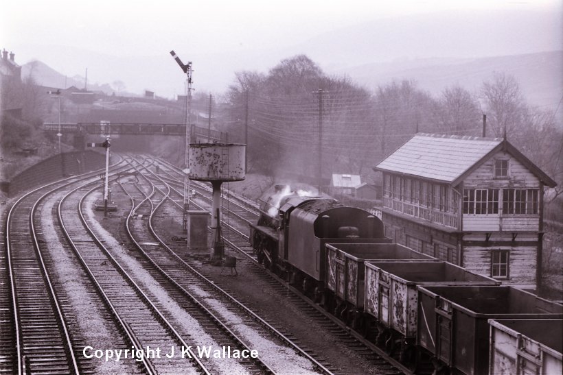 Stanier Black 5 45203 passes Hall Junction signal box in 1968 with a down empty mineral working.