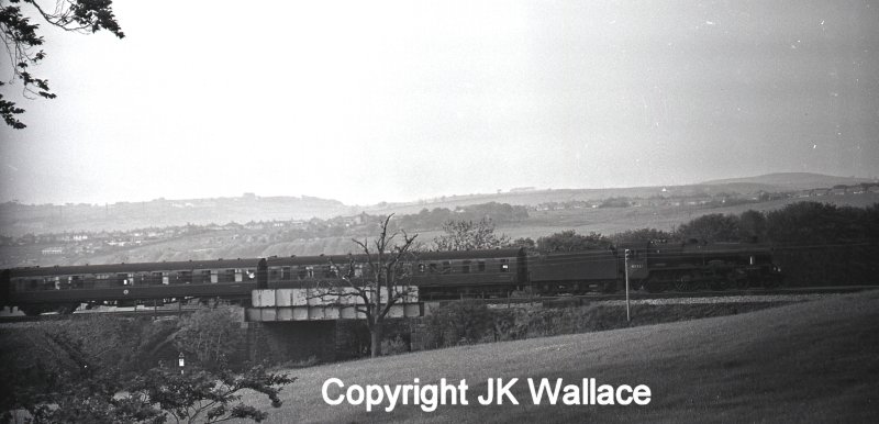 LMS (BR) Stanier Jubilee 45581 'Bihar & Orissa' climbing out of Burnley towards Copy Pit with 1X32 return advertised execursion Blackpool North – Leeds City at 19.21 Whit Monday 30 May 1966.