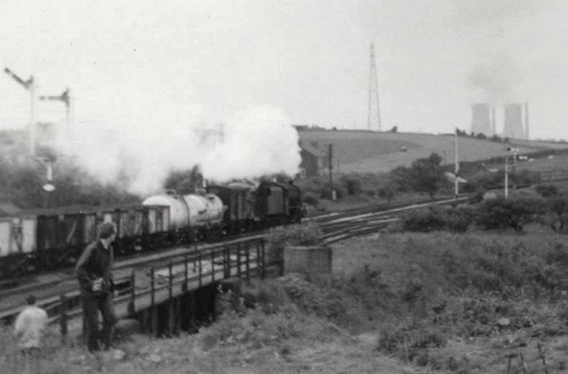 A second view of Stanier 8F departing westwards from Rose Grove with a freight train (6P32) at 13.10 hrs to Wyre Dock, near Fleetwood, on 22 July 1968.