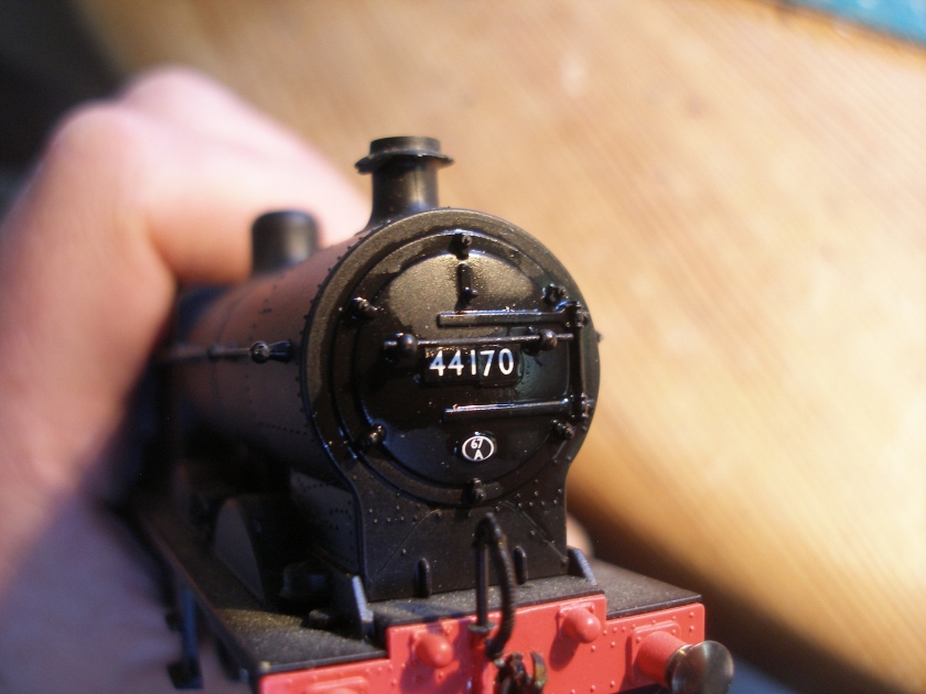 Renumbering of a Hornby 4F ready-to-run loco using Fox Transfers; smokebox door numbers in place, but the photograph highlights the poor alignment.
