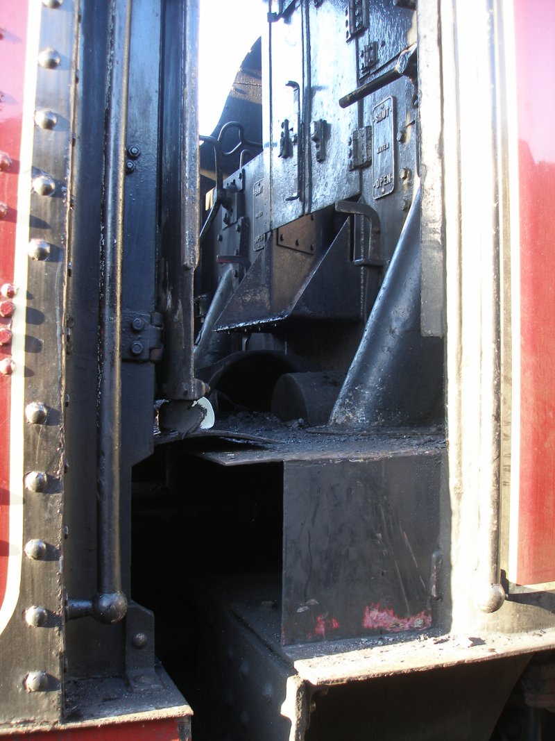 ex-LMS Stanier 8F 2-8-0 48624 as seen at the Great Central Railway, Loughborough on 30 December. Detail of cab doors, driver's side.