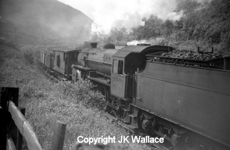 Banker Crab 42727 is seen having passed under Knotts Road bridge at the rear of a freight train bound for Copy Pit and Rose Grove hauled by WD 90412.