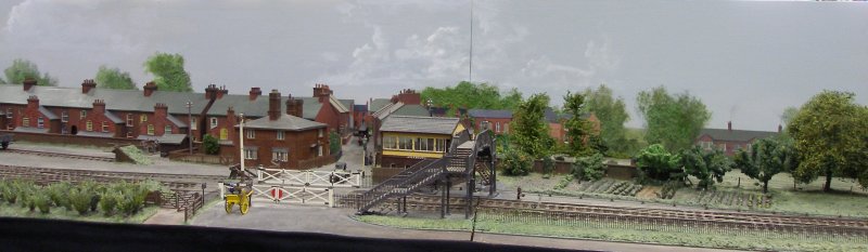 Guy William's Aylesbury (18.2mm gauge) showing the goods yard headshunt as it passes across the Park Street level crossing.
