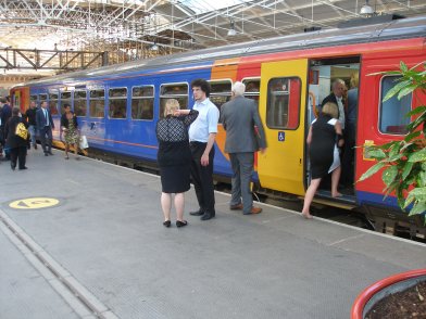 A seriously overcrowded Class 153 awaits departure for Derby from Crewe on the evening of 31 May 2014