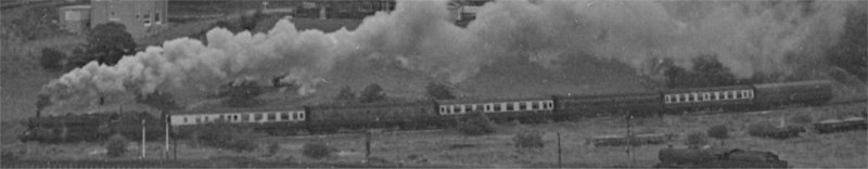 Steam-hauled Blackpool excursion at Todmorden showing mix of maroon and blue and grey BR Mark 1 carriages.