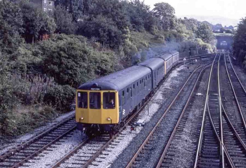 A Class 104 2-car DMU heads a four car consist heading for Copy Pit and Preston on 1 October 1984.