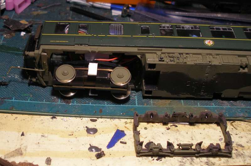 Hornby Class 110 DMU re-motoring project: plastic strips added to Black Beetle frame supports ready for the Hornby side frames to be added