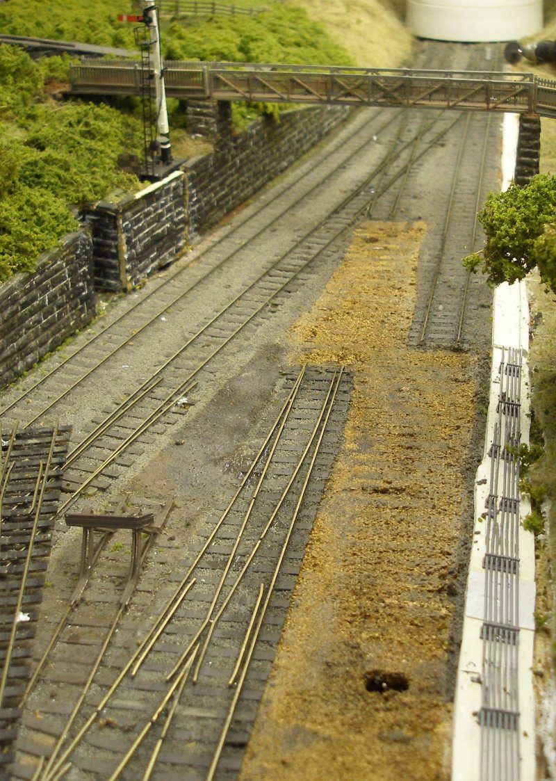 Hall Royd Junction model railway layout: the original 30" pair of points forming a cross-over have now been lifted, with the ballast cleared away from the cork underlay