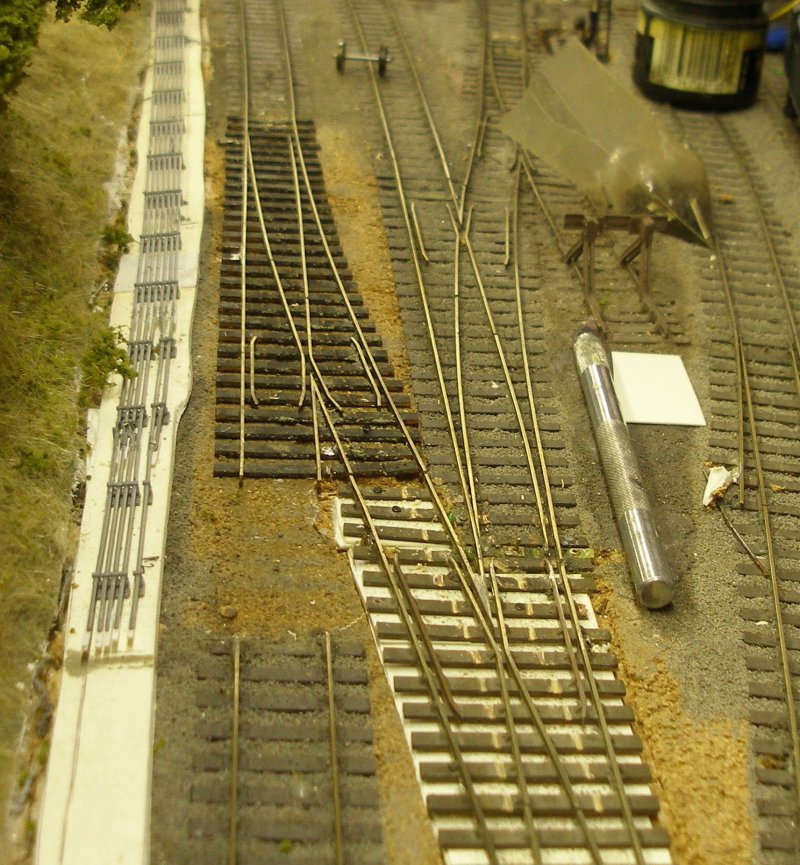 Hall Royd Junction model railway layout: the rail height of the new points has now been adjusted.