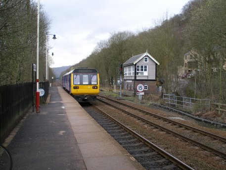 Pacer 142 054 departs from Hebden Bridge railway station in the Leeds direction on 19 April 2013