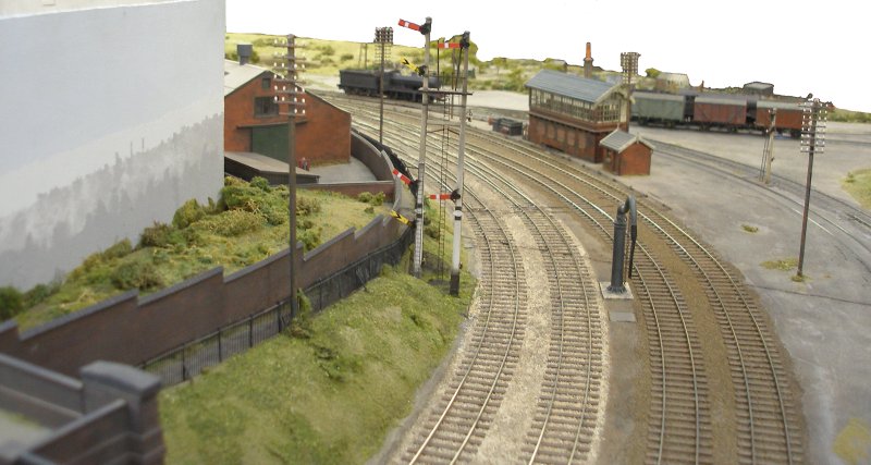 Approaches to Leicester South from the south, showing Down bracket with repeater arms. Shipley Model Railway Society's Leicester South layout as seen at Alexandra Palace on Sunday 29 March 2015.