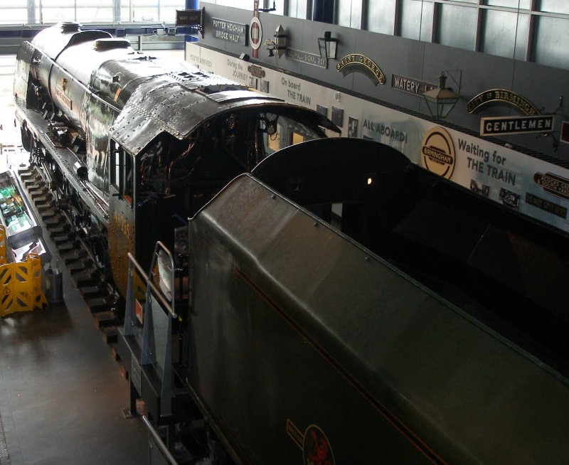 Stanier 'Coronation' Pacific 46235 'City of Birmingham' as seen in the ThinkTank Museum on 10 October 2015, showing three quarters rear view from the rear gallery.