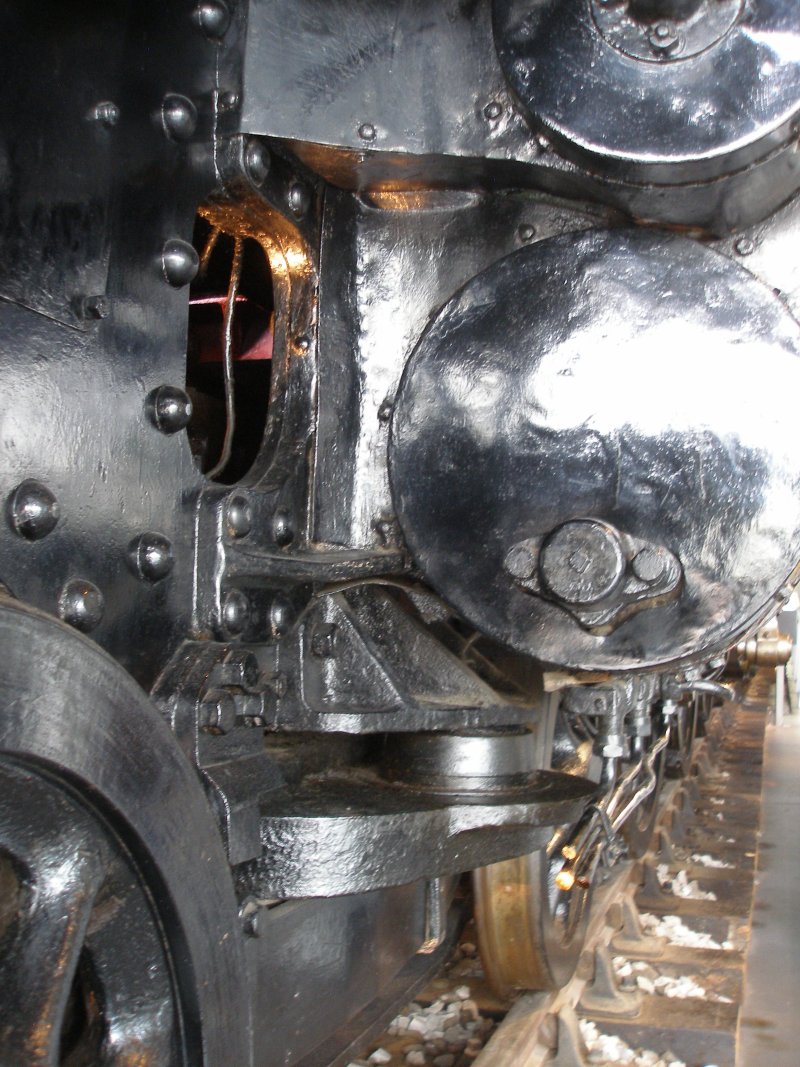 Stanier 'Coronation' Pacific 46235 'City of Birmingham' as seen in the ThinkTank Museum on 10 October 2015, with close-up of the bogie bracket behind the driver's side cylinder.