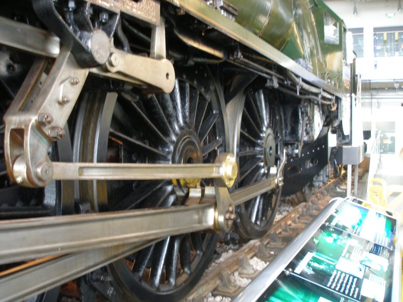 Stanier 'Coronation' Pacific 46235 'City of Birmingham' as seen in the ThinkTank Museum on 10 October 2015, with close-up of piping on the underside of the driver's side footplating.