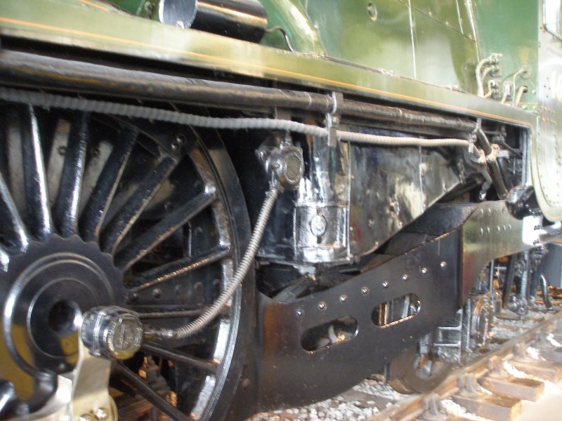Stanier 'Coronation' Pacific 46235 'City of Birmingham' as seen in the ThinkTank Museum on 10 October 2015, with side view of the driver's side ash pan and rear truck.