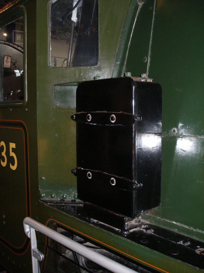 Stanier 'Coronation' Pacific 46235 'City of Birmingham' as seen in the ThinkTank Museum on 10 October 2015, with AWS battery box mounted on the fireman's side ash. Note that the box is painted black, and not loco green.