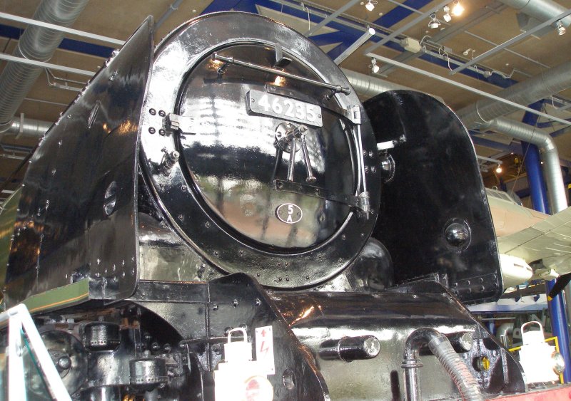 Stanier 'Coronation' Pacific 46235 'City of Birmingham' as seen in the ThinkTank Museum on 10 October 2015.  Three quarters view from front, showing smokebox and smoke deflector details, Fireman's side.