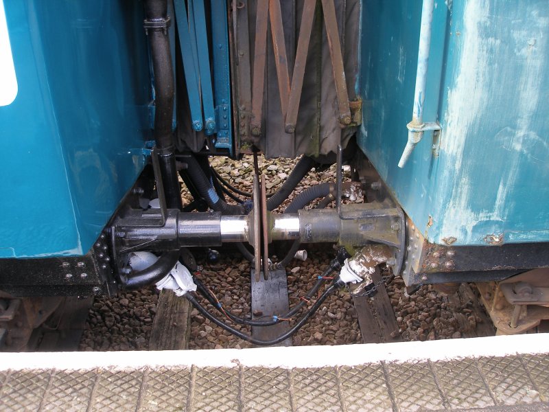 Metro-Cammell DMU Class 101 showing lower section of connected corridor connections, exhaust pipes and buffers.