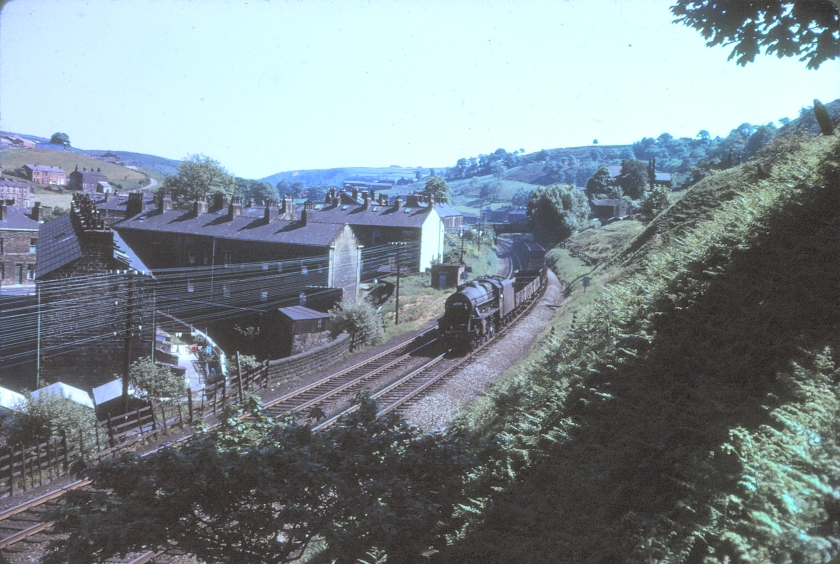 Looking towards Walsden and Manchester, from Calder Valley railway bridge 101 with a Stanier Black 5 approaching with a short freight train 1967/68