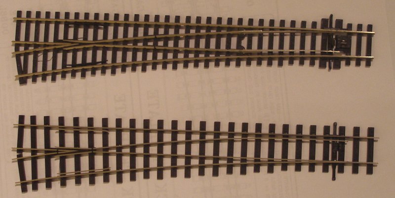 PECO Streamline Bullhead OO scale Code 75 Unifrog point (turnout) and PECO HO flat-bottomed point side by side.