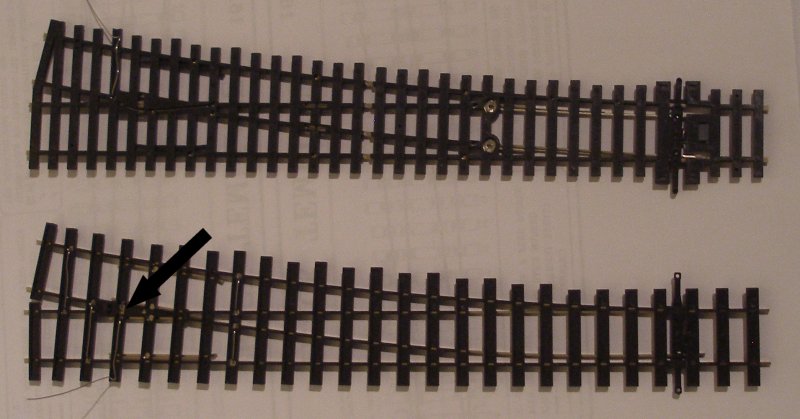 PECO Streamline Bullhead OO scale Code 75 Unifrog point (turnout) and PECO HO flat-bottomed point showing the undersides and the differences in wiring