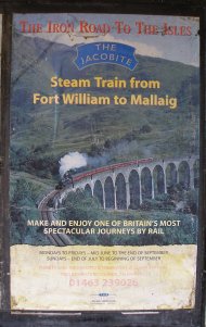 Care-worn poster advertising West Coast Railways train on the 'Iron Road to the Isles' at Glenfinnin 18 October 2013. Services in the year of publiction ended in September.