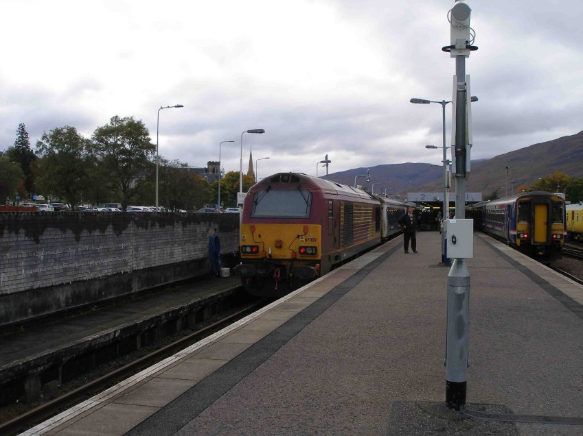 67009 stands at Fort William with the stock of the southbound sleeper.
