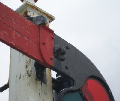 Close-up view of front of Rayner Wilson arm on LYR signal showing stop and corresponding ridge on spectacle plate , Bala Lake Railway 16 July 2015