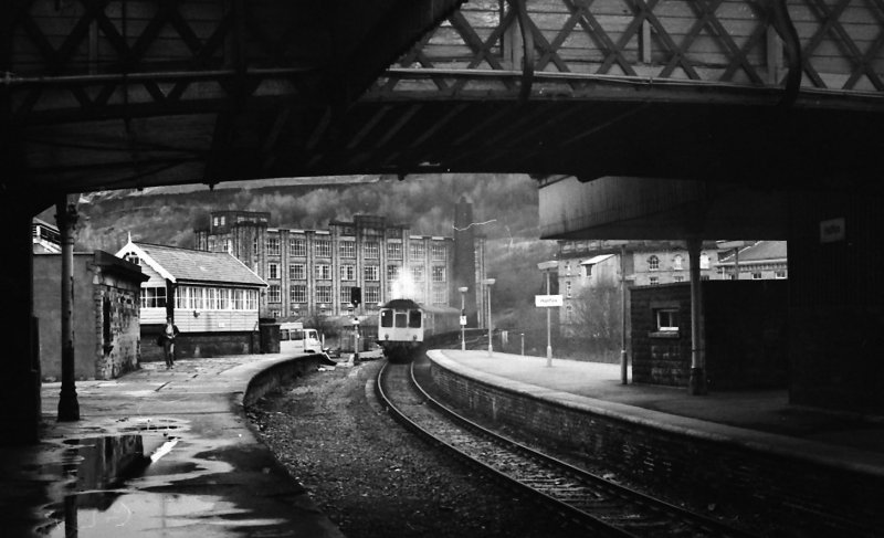 Class 110 3-car Calder Valley unit leaves Halifax whilst working the 10.45 Blackpool-Leeds service on a wet 2 January 1987.