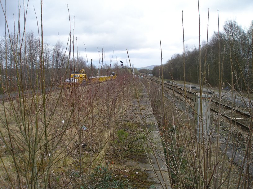 Rose Grove Station looking north towards Gannow Junction with the permanent way train stabled in the loop in readiness for the major relaying of the Gannow Junction - Colne railway line on Sunday 23 March 2014.