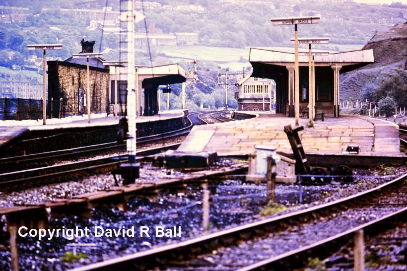 Swerby Bridge railway station 1971: A view looking eastwards showing the two platform roads, with the Up Passenger Loop passing in front of the photographer. In the distance can be seen signal 45 (the distant was worked by Milner Royd Junction), whilst the bracket signal still has arms on the two principal dolls for the Up Main and Up Passenger Loop.