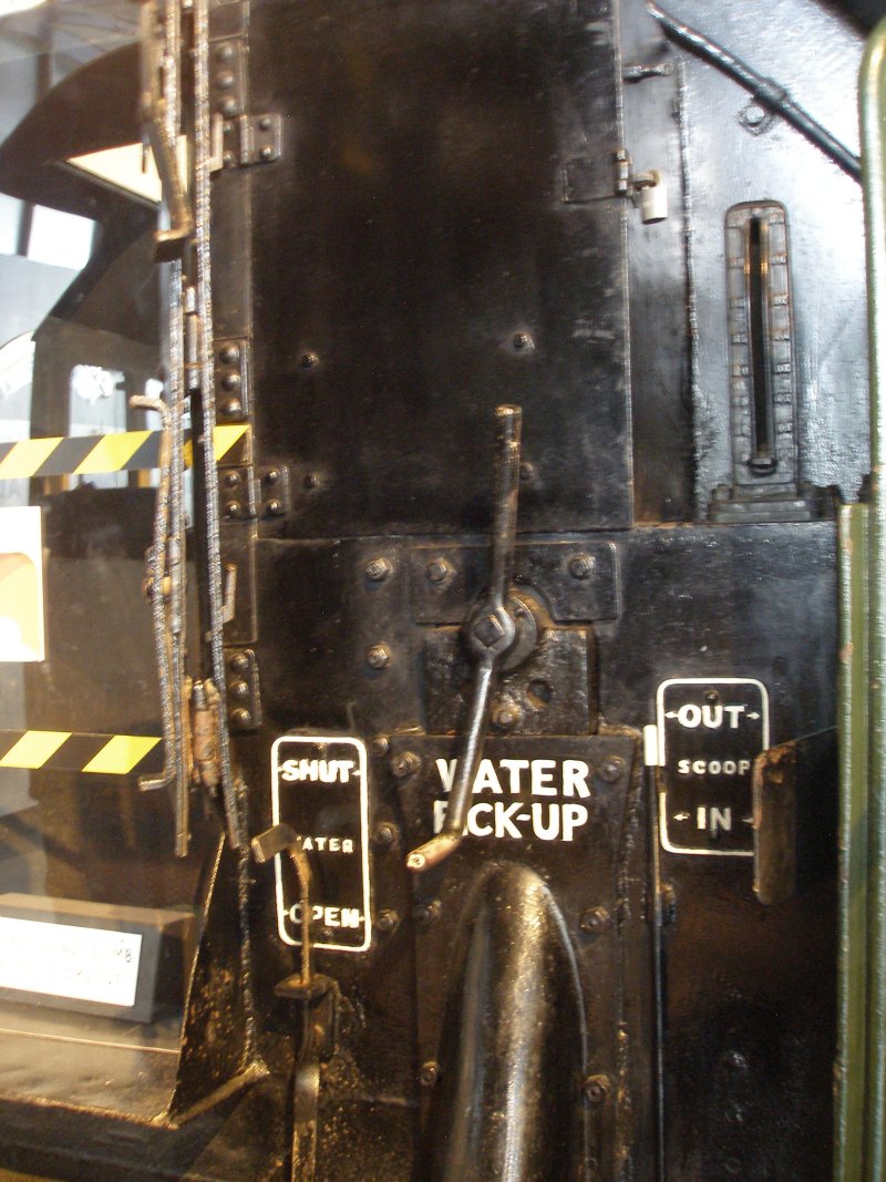 Stanier 'Coronation' Pacific 46235 'City of Birmingham' as seen in the ThinkTank Museum on 10 October 2015.  Driver's side of the tender showing water scoop handle, and tender tank water gauge.