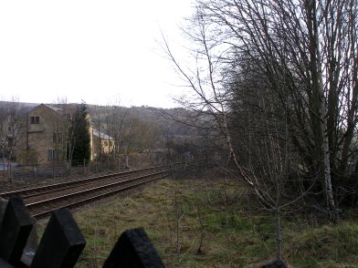 The end of Platform 1 at Todmorden Railway station looking towards Leeds and the viaduct over the fence marking the end of the public area on 19 April 2013.
