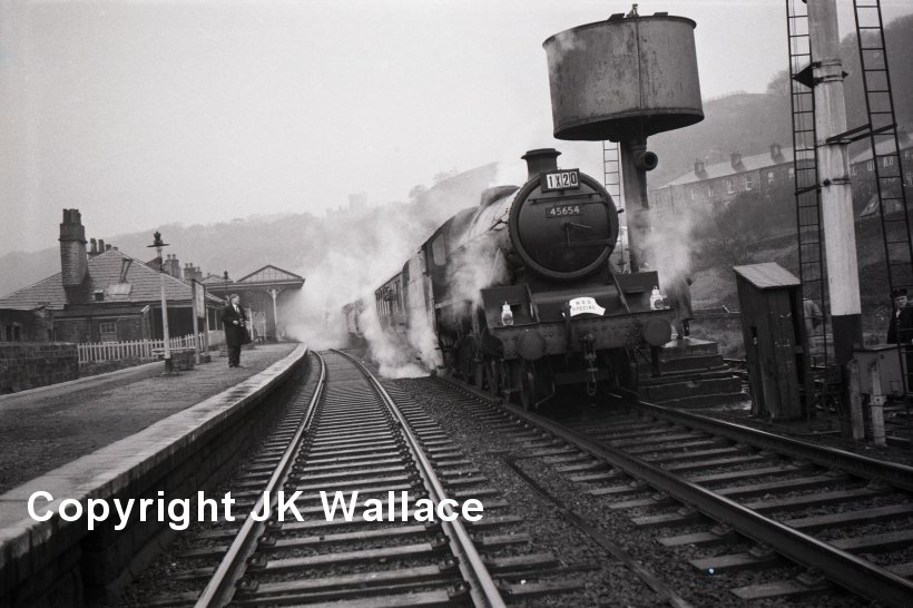 Stanier Jubilee 45654 'Hood', a Newton Heath loco withdrawn on 25 June 1966., photographed on 13 November 1965, working Warwickshire Railway Society excursion, as seen at Todmorden.
