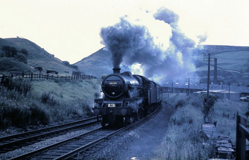 Stanier Jubilee 45739 'Ulster' heading away from Todmorden and Stansfield Hall Junction up the Cliviger Gorge towards Copy Pit and Burnley in 1966 with excursion 1M07.
