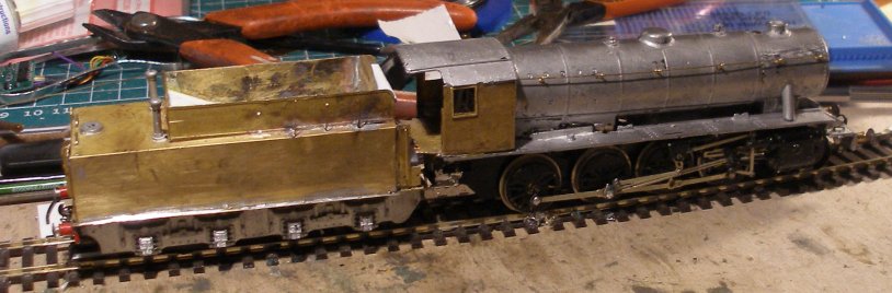 eBay 'spares of repair' WD 2-8-0 on the work bench after paint stripping and with a new motorfitted