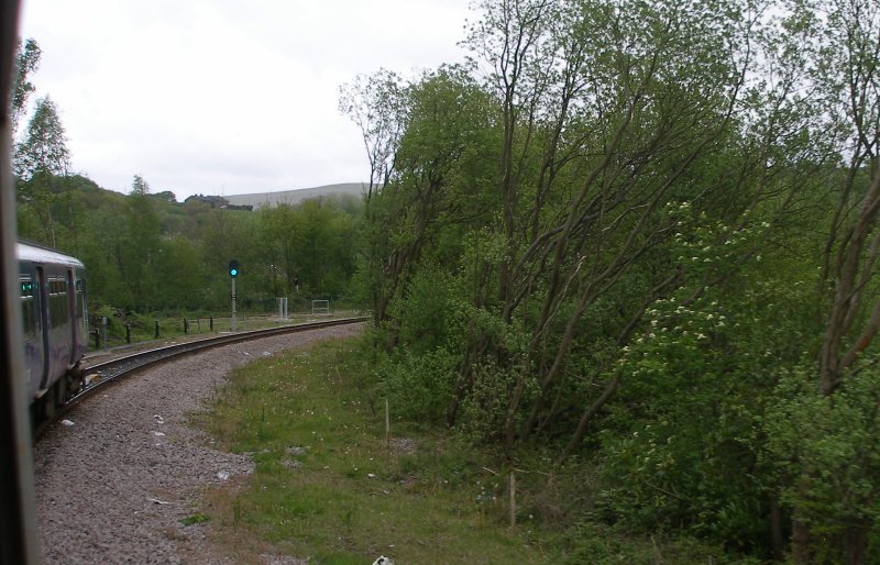 First train enters the Todmodern curve from Stansfield Hall Junction
