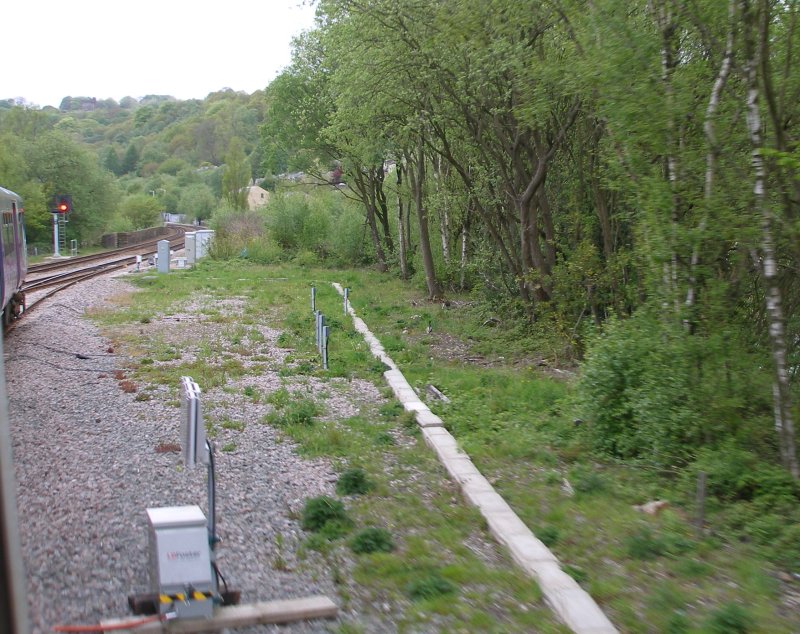 First train leaves the Todmodern curve at Todmorden Viaduct Junction