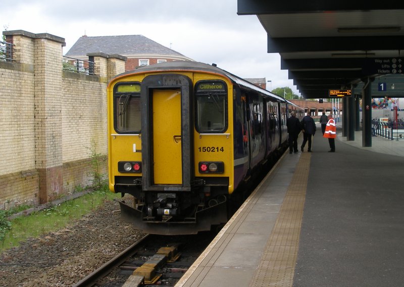 Second train on Todmodern curve arrives at Blackburn formed of 150.214.