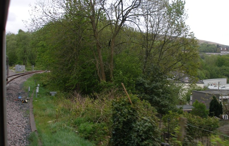 First train approaches the Todmodern curve from Copy Pit